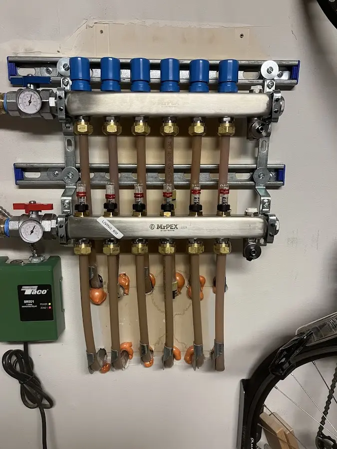 Plumber performing Water Heater Repair at a residential property in Glassboro