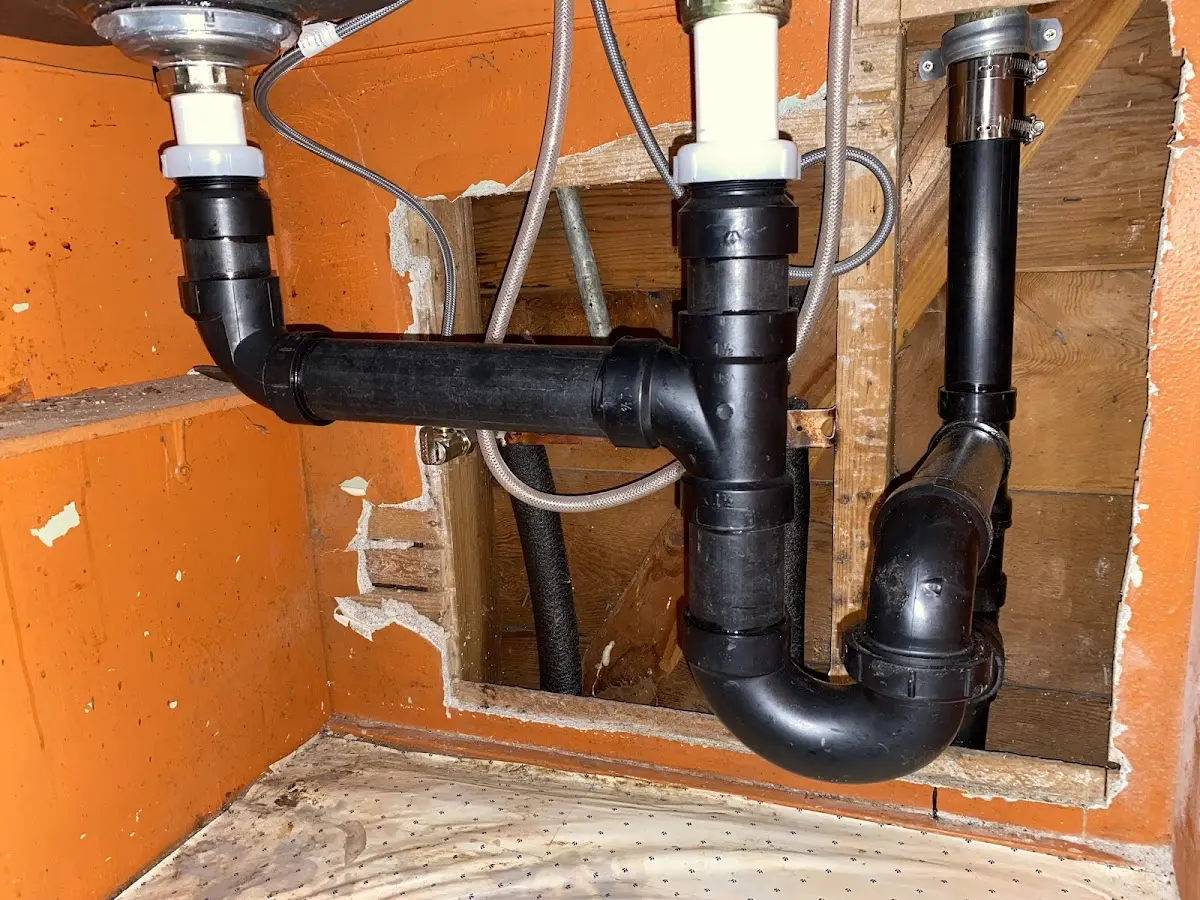 Professional Garbage Disposal Repair equipment and tools on the job in Glassboro
